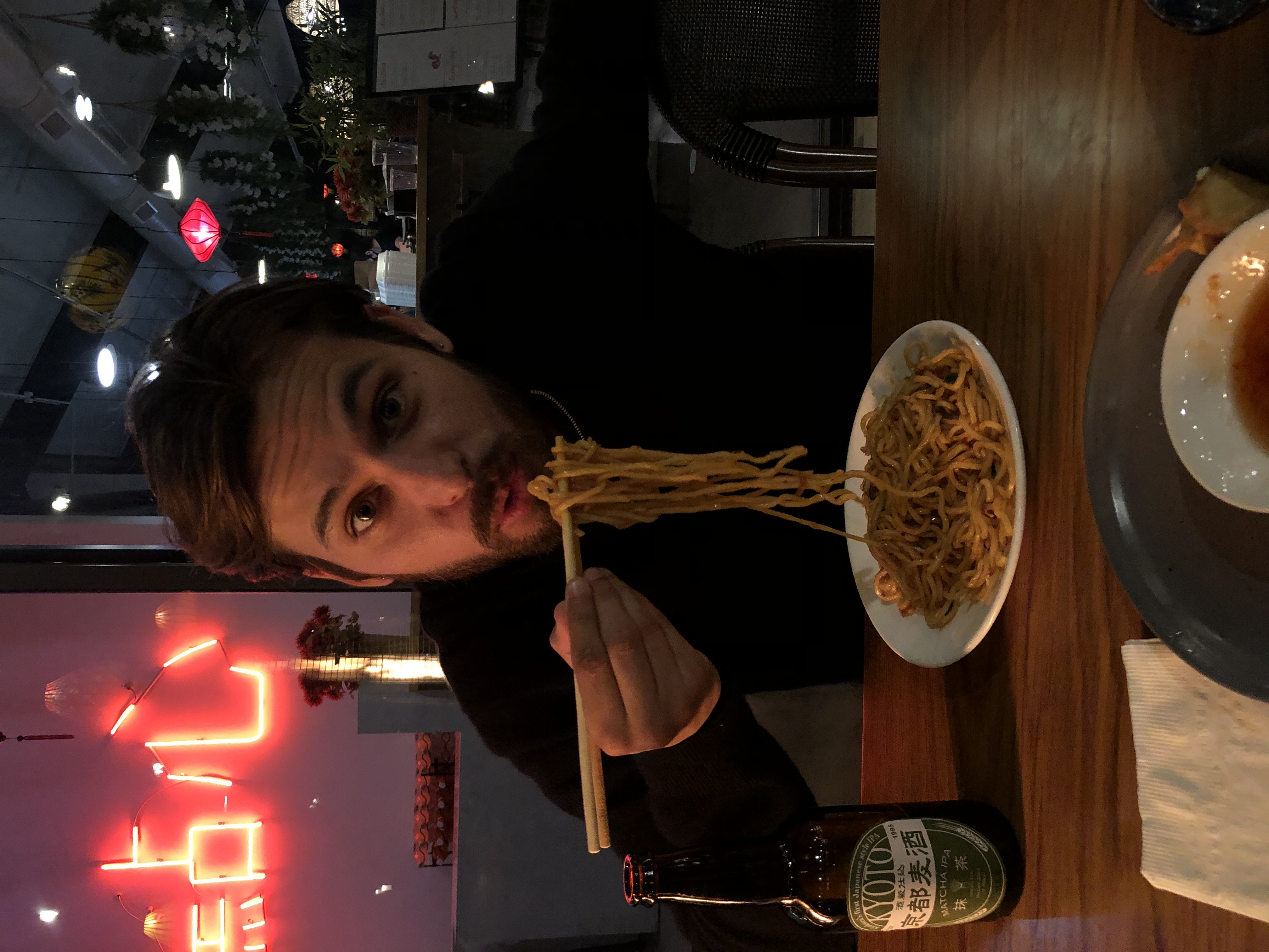 Nathan eating Noodle